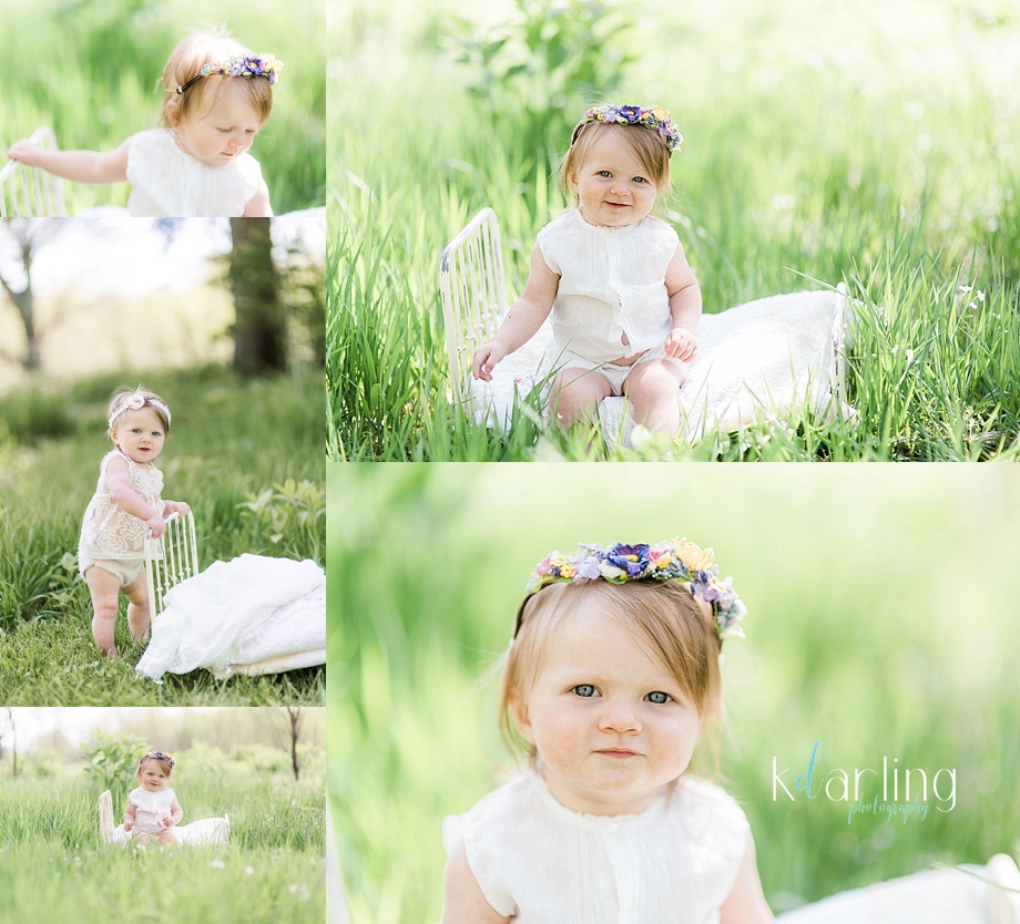 Baby girl in a floral crown and antique dress