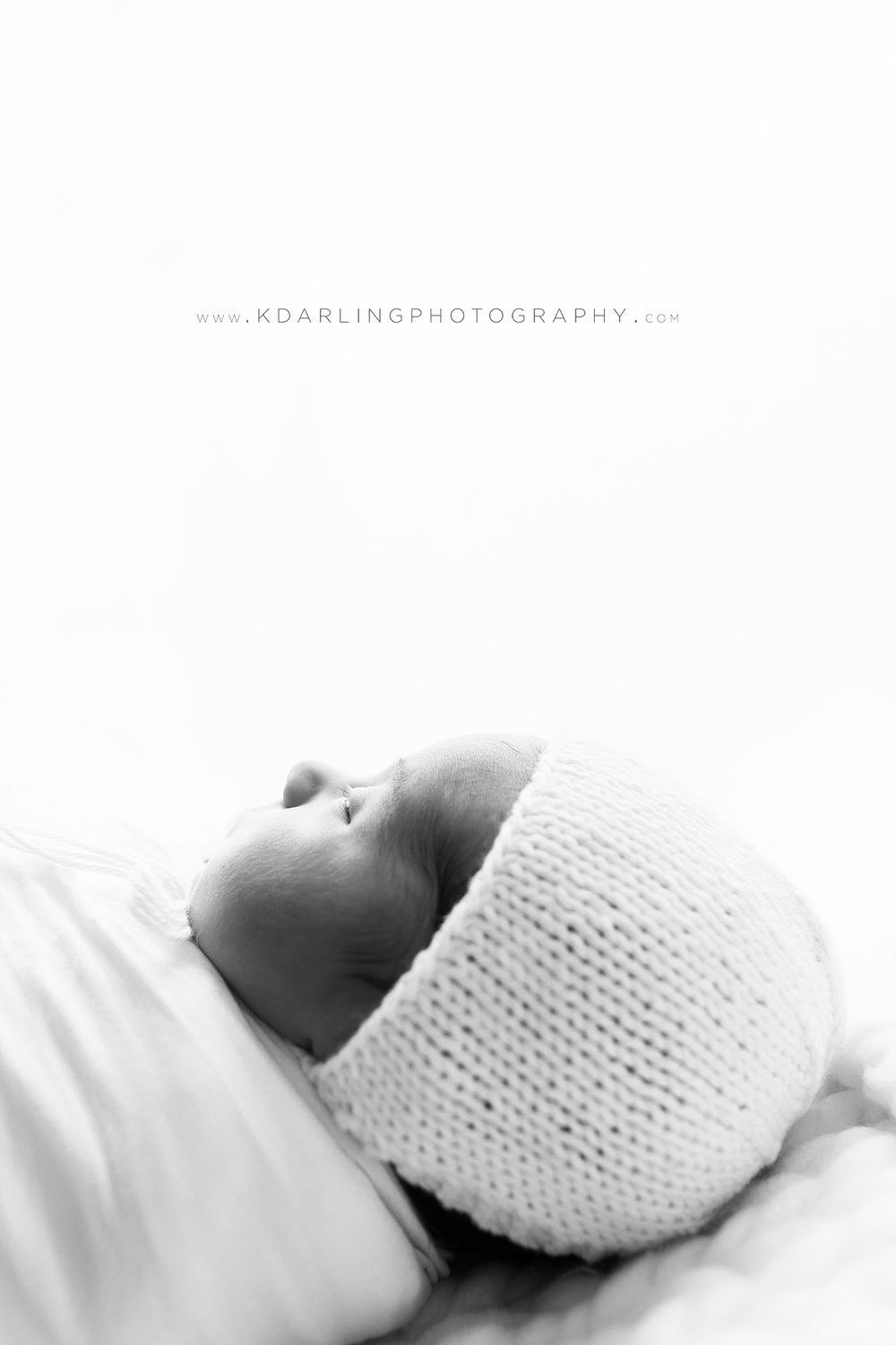 Backlit image of a newborn baby boy