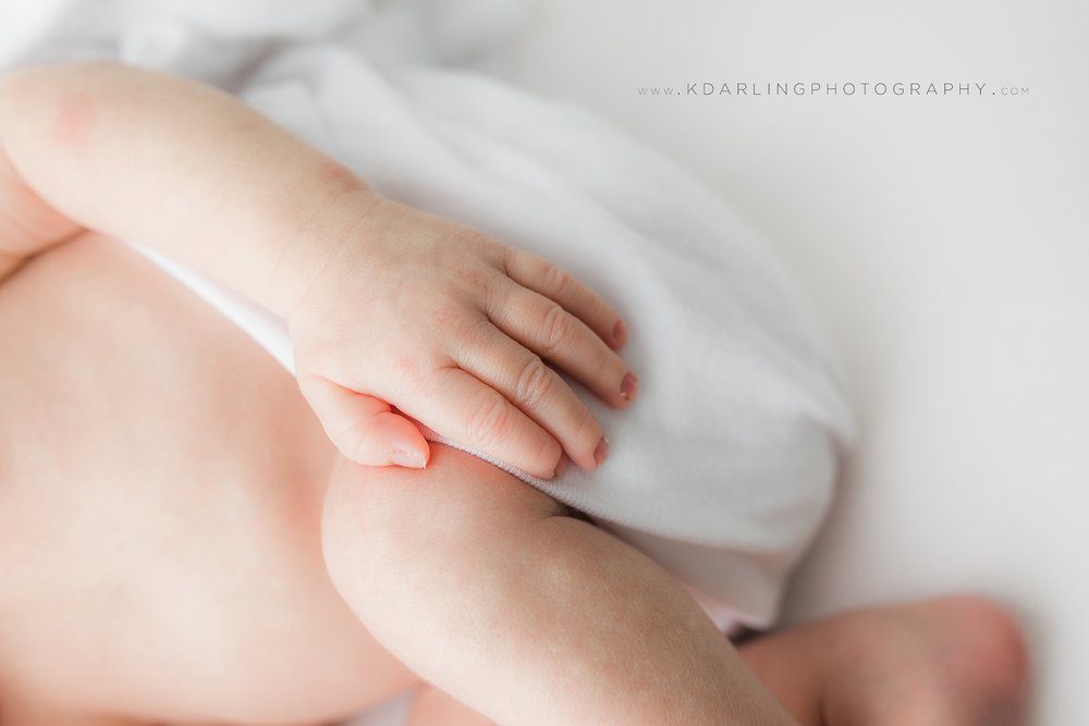 Close up of newborn baby boy hand