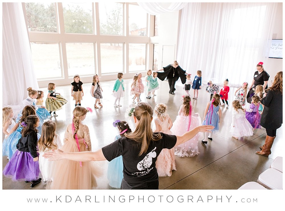 Dancing in a circle with princesses in Champaign, IL