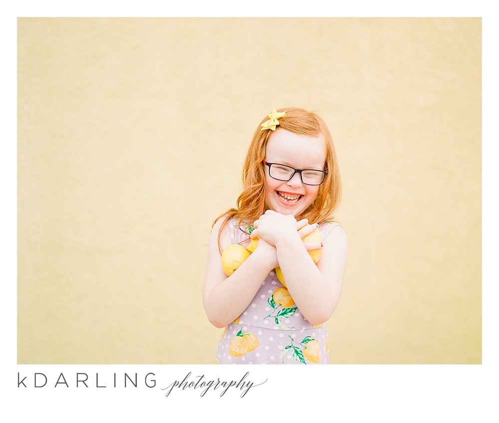 Photo-session-with-yellow-lemons-and-kindergarten-age-girl-downtown-champaign-Il-film-photographer_0015.jpg