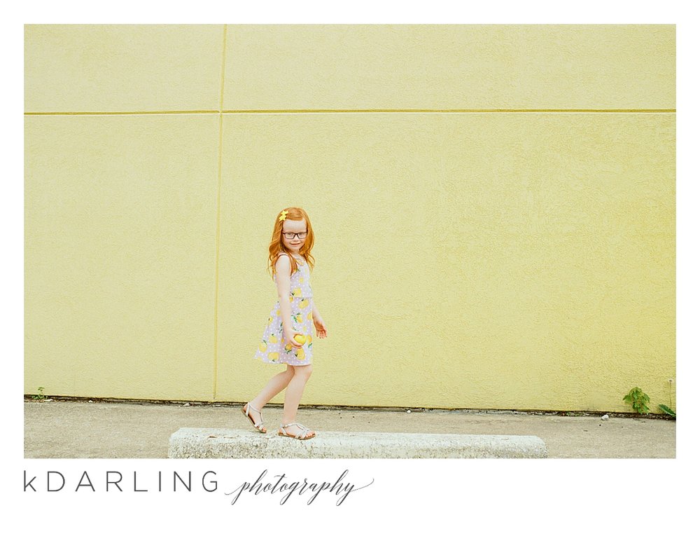 Photo-session-with-yellow-lemons-and-kindergarten-age-girl-downtown-champaign-Il-film-photographer_0013.jpg