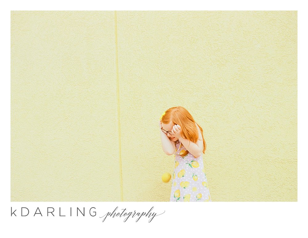 Photo-session-with-yellow-lemons-and-kindergarten-age-girl-downtown-champaign-Il-film-photographer_0012.jpg