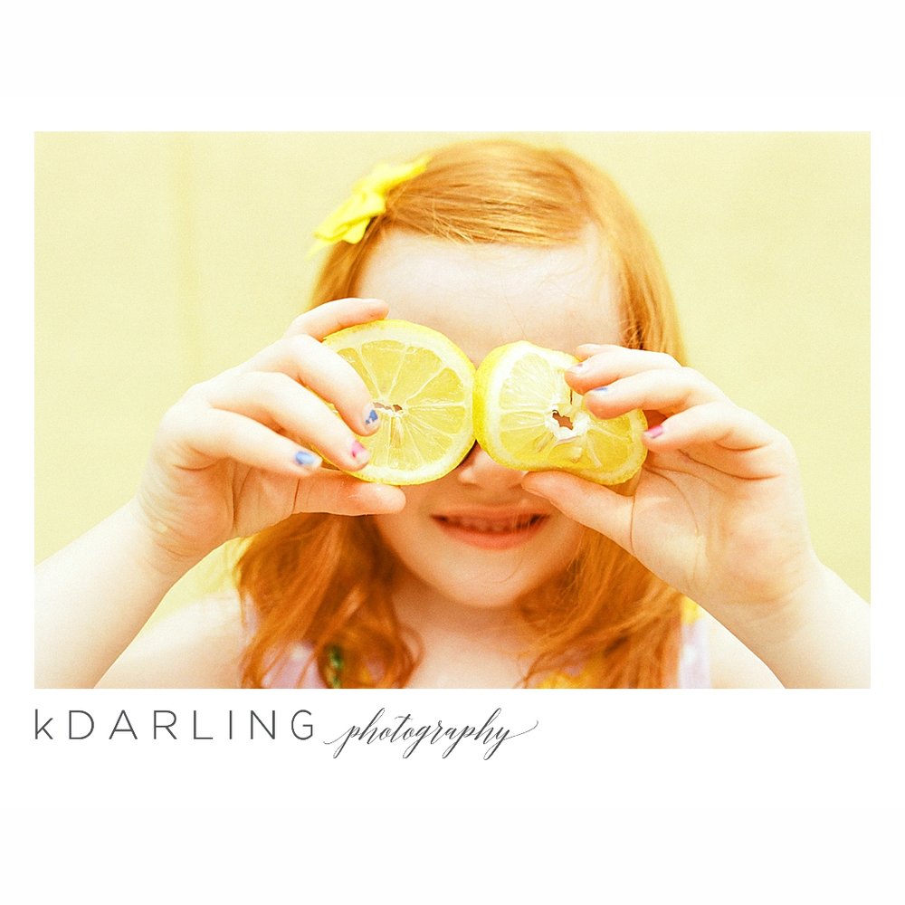 Photo-session-with-yellow-lemons-and-kindergarten-age-girl-downtown-champaign-Il-film-photographer_0001.jpg