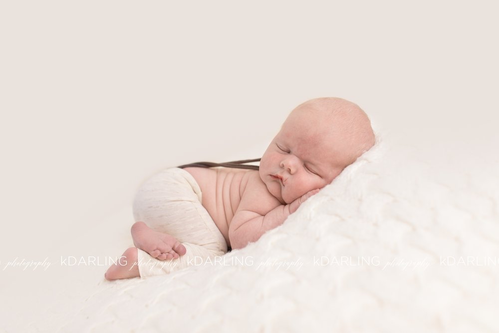 Caryn Mosernewborn session - Kristin does an amazing job! She has great patience when working with newborns! Taking breaks for feedings or fussiness and then able to capture the most adorable pictures!! Thank you so much!