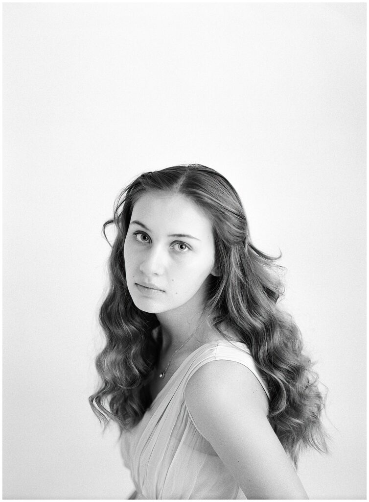 Teen girl milestone portrait in natural light studio